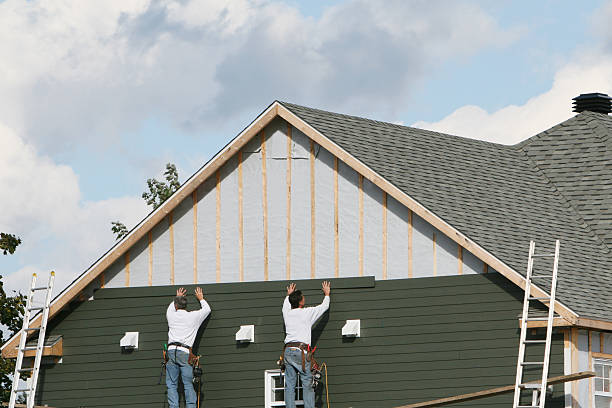 Professional Emergency Siding Repair technician working in Etters, PA